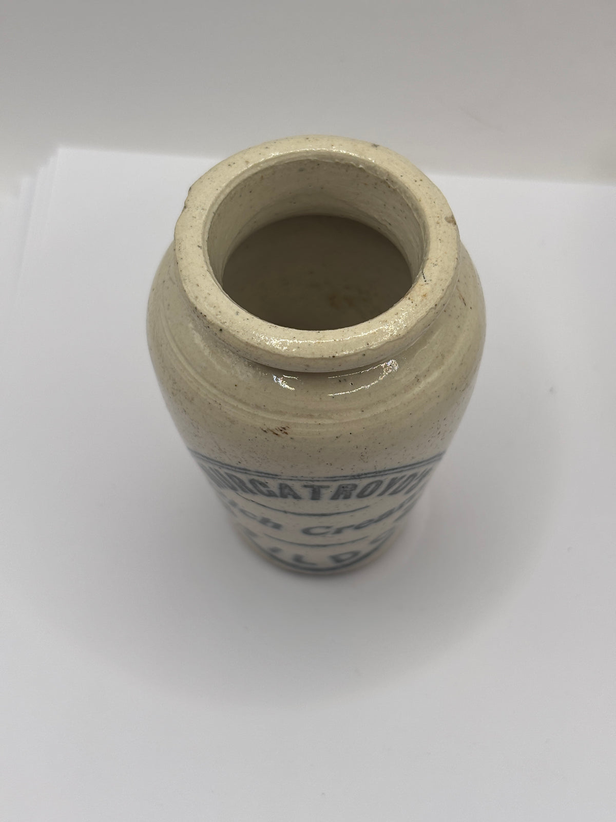 Old advertising stoneware cream pot, Murgatroyds rich cream Baildon. Chipped