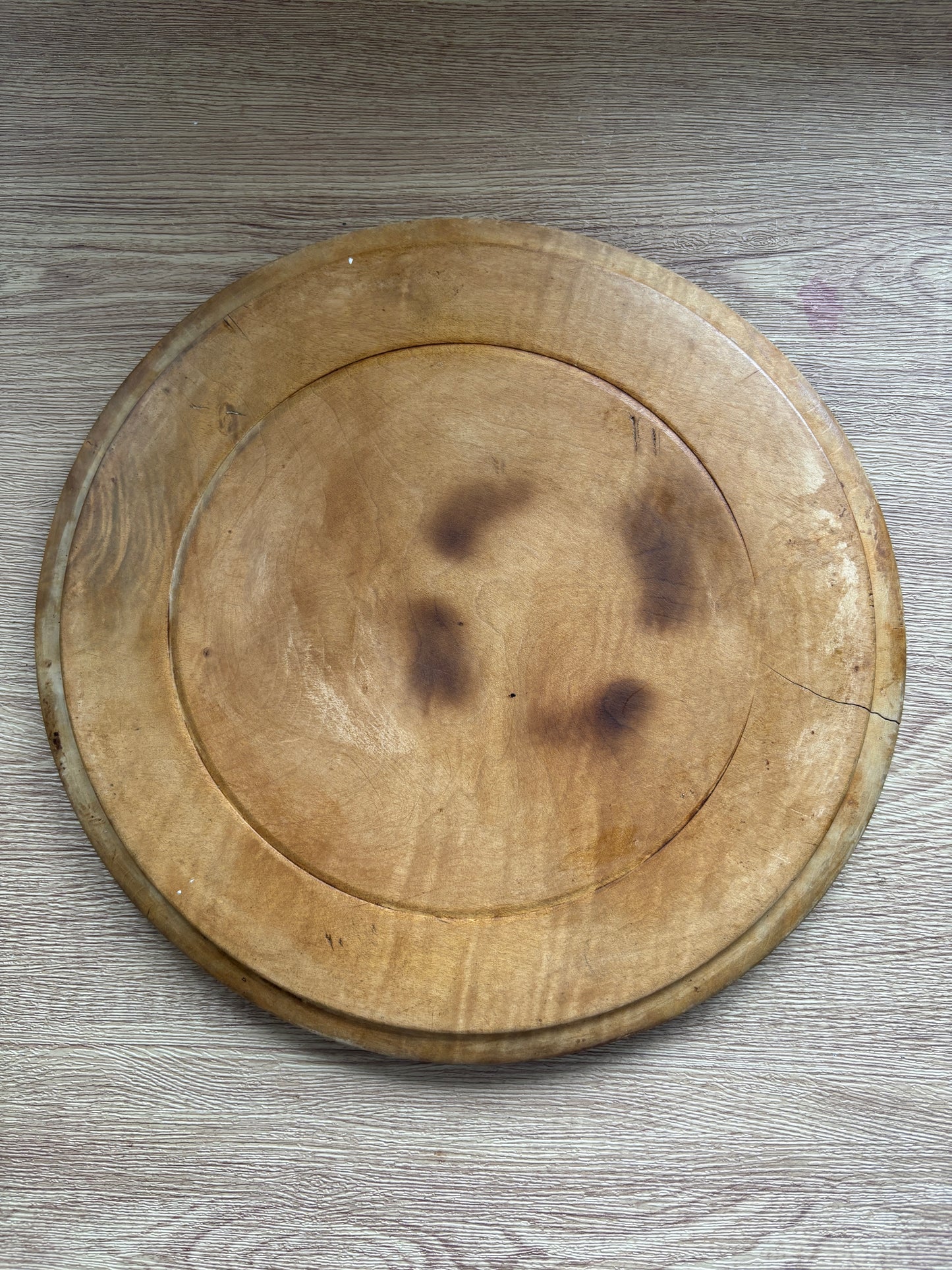 Old wooden carved bread board