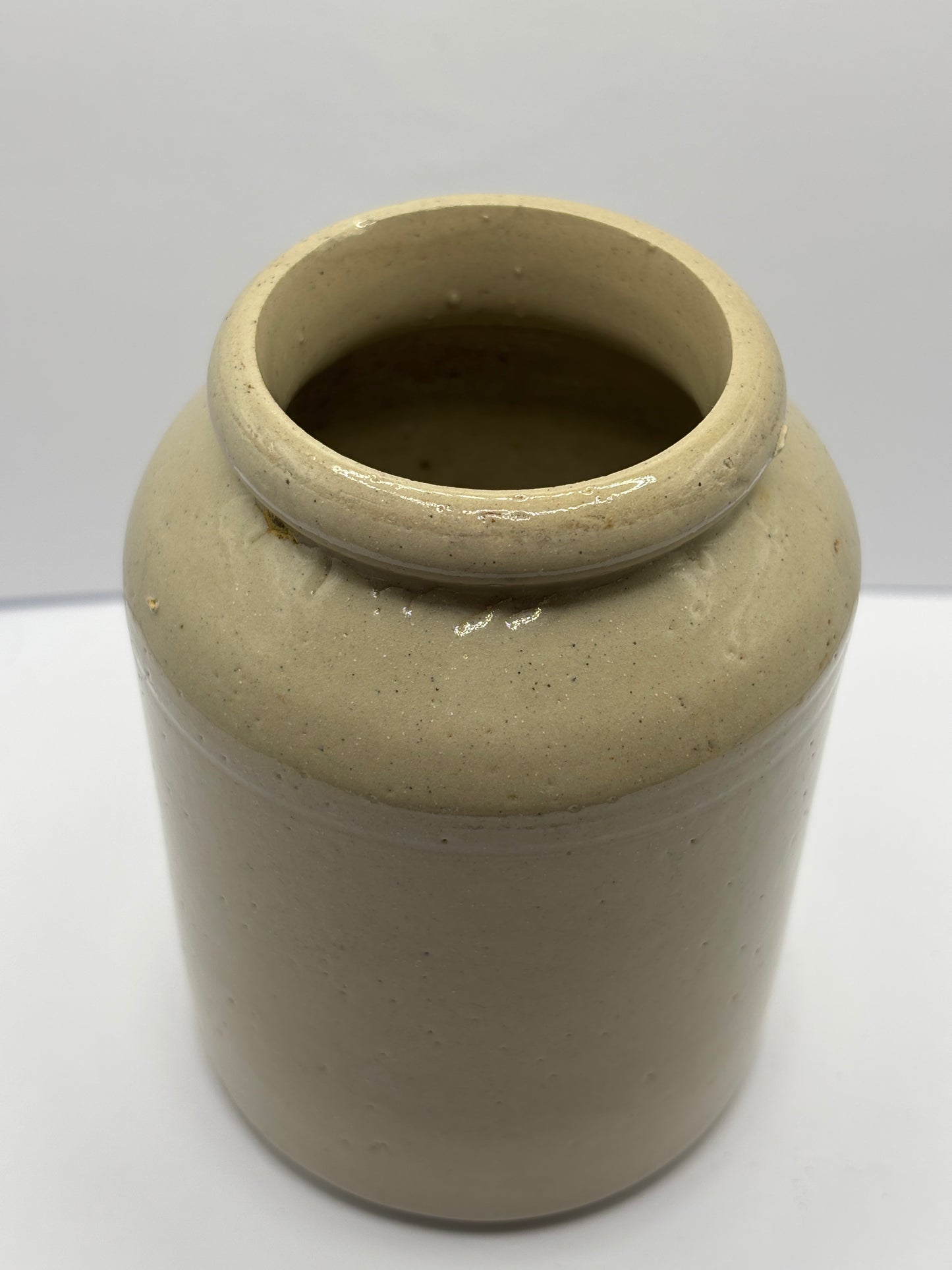 Old off white stoneware jar