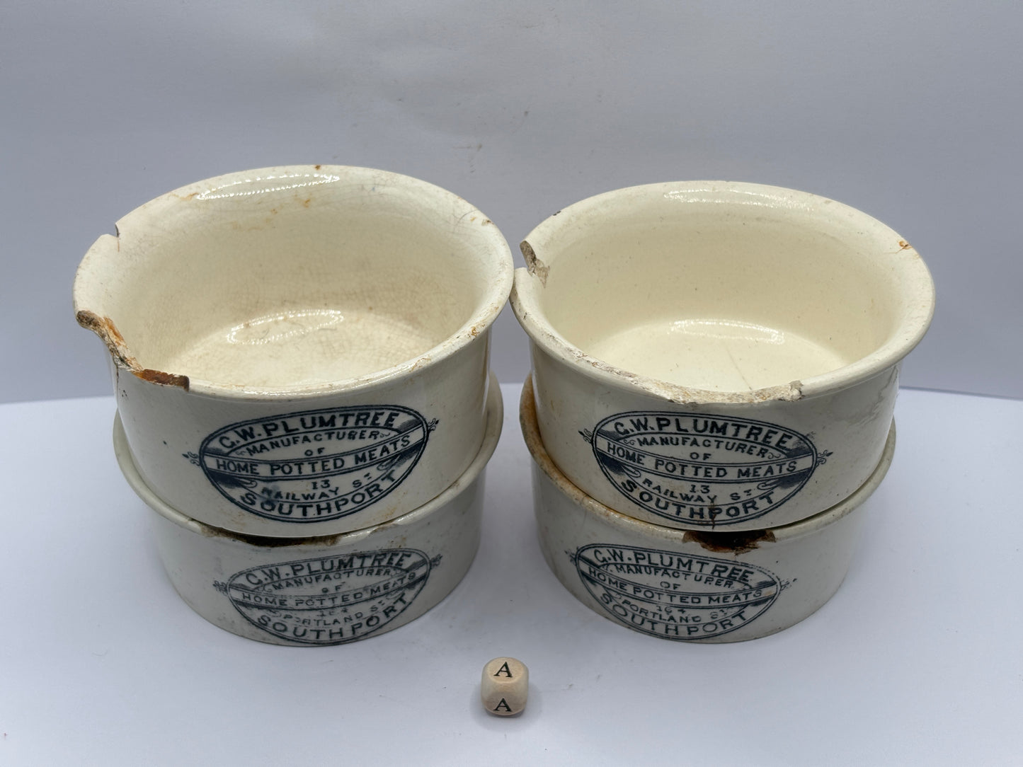 4 old advertising meat paste pots (a) damaged