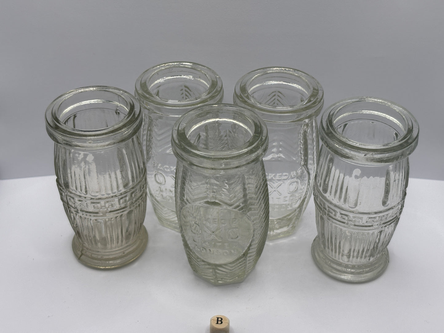 5 old clear glass meat paste jars (B)