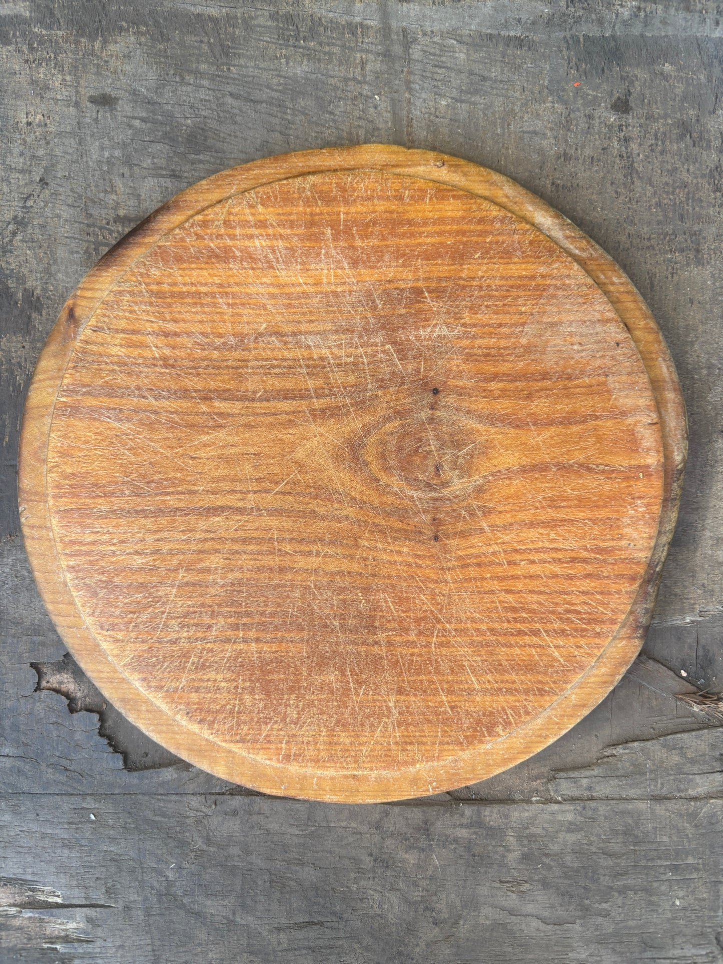Old wooden carved bread board