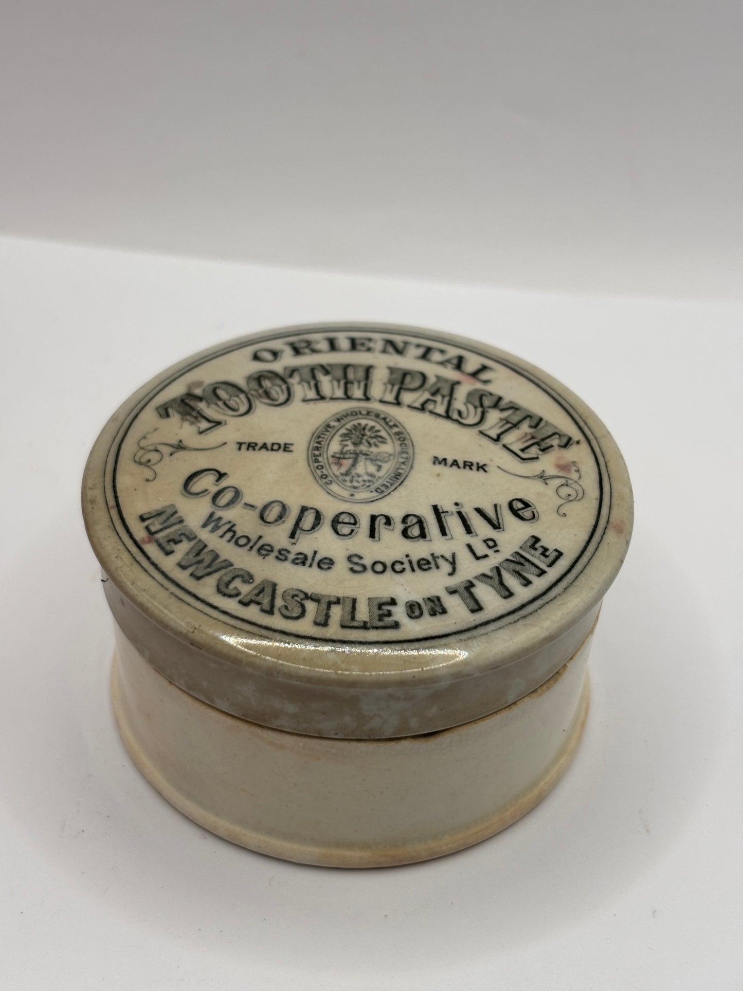 Old advertising lid and base, oriental toothpaste