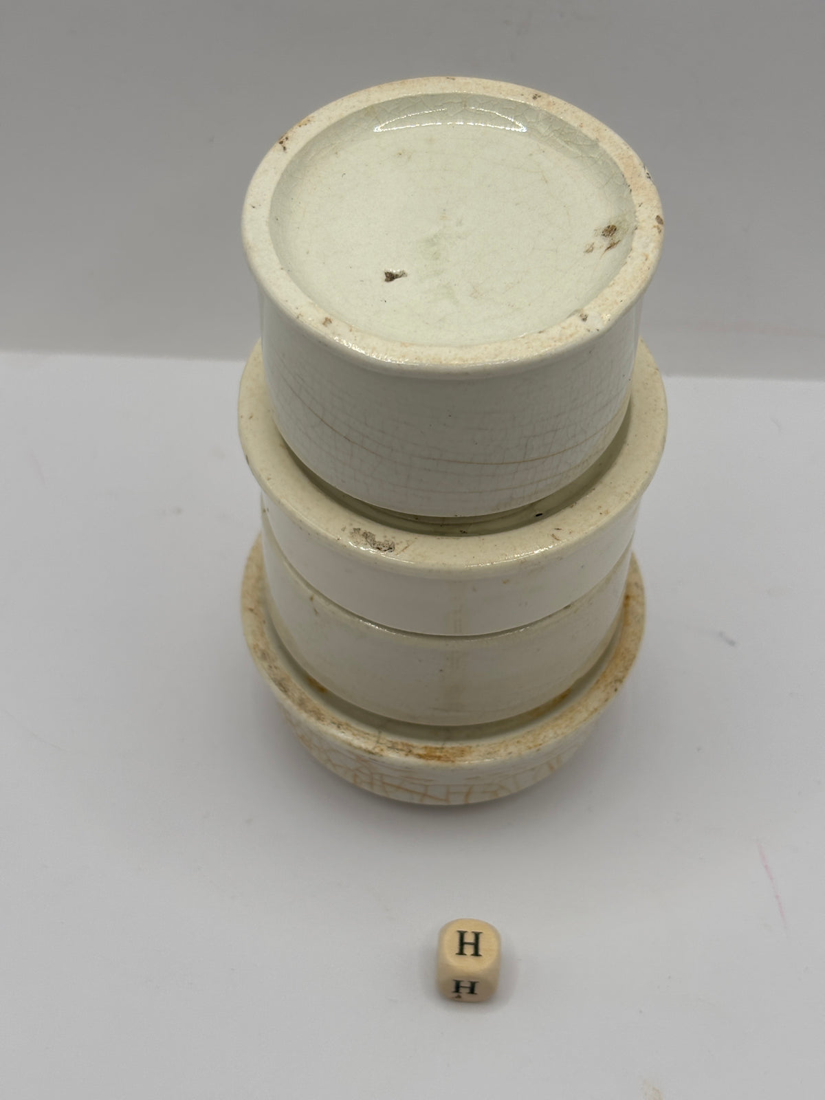 4 old stoneware pot lid bases, stackers (H)
