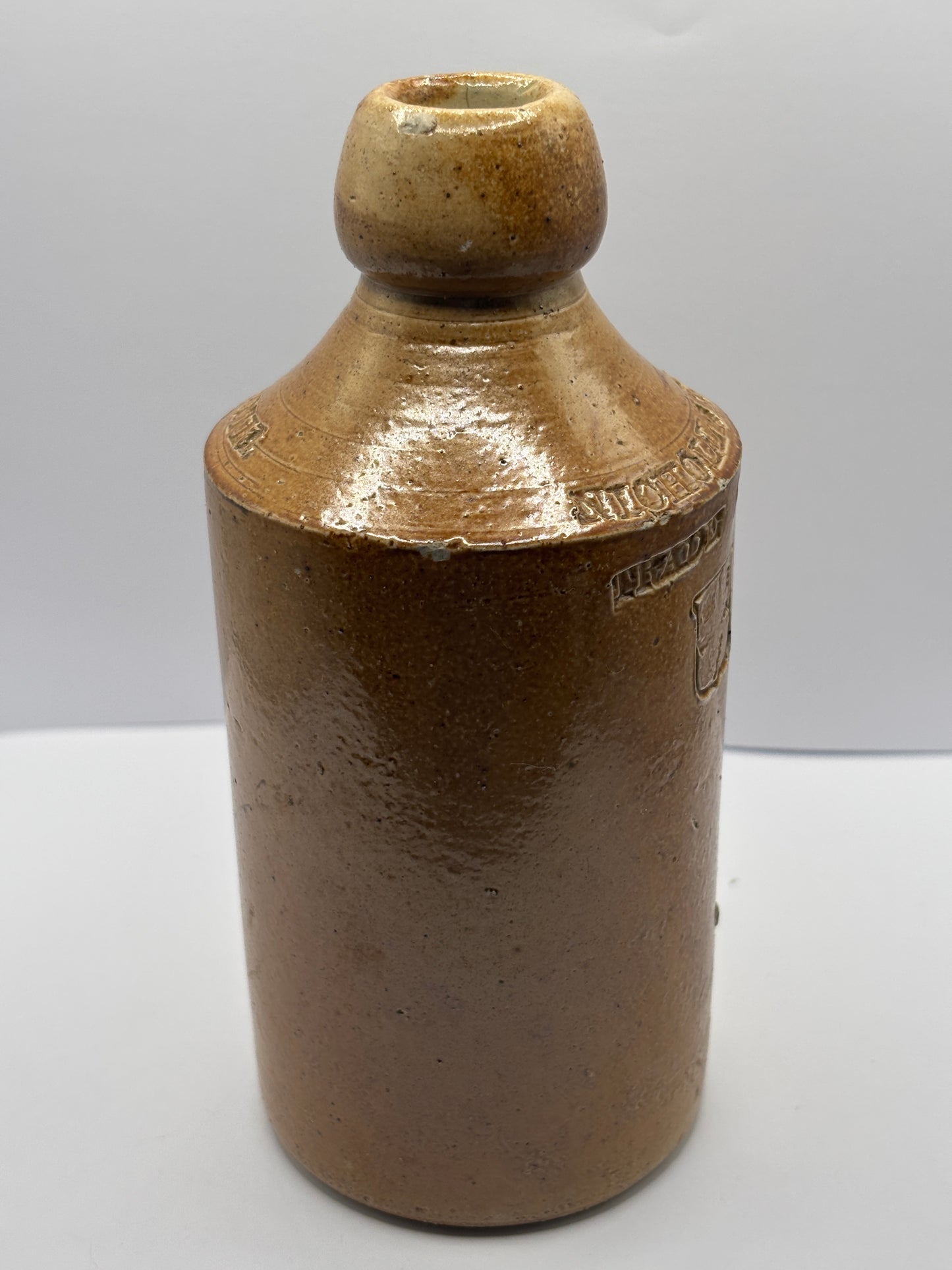 Old Colchester impressed ginger beer bottle, Nicholl & co