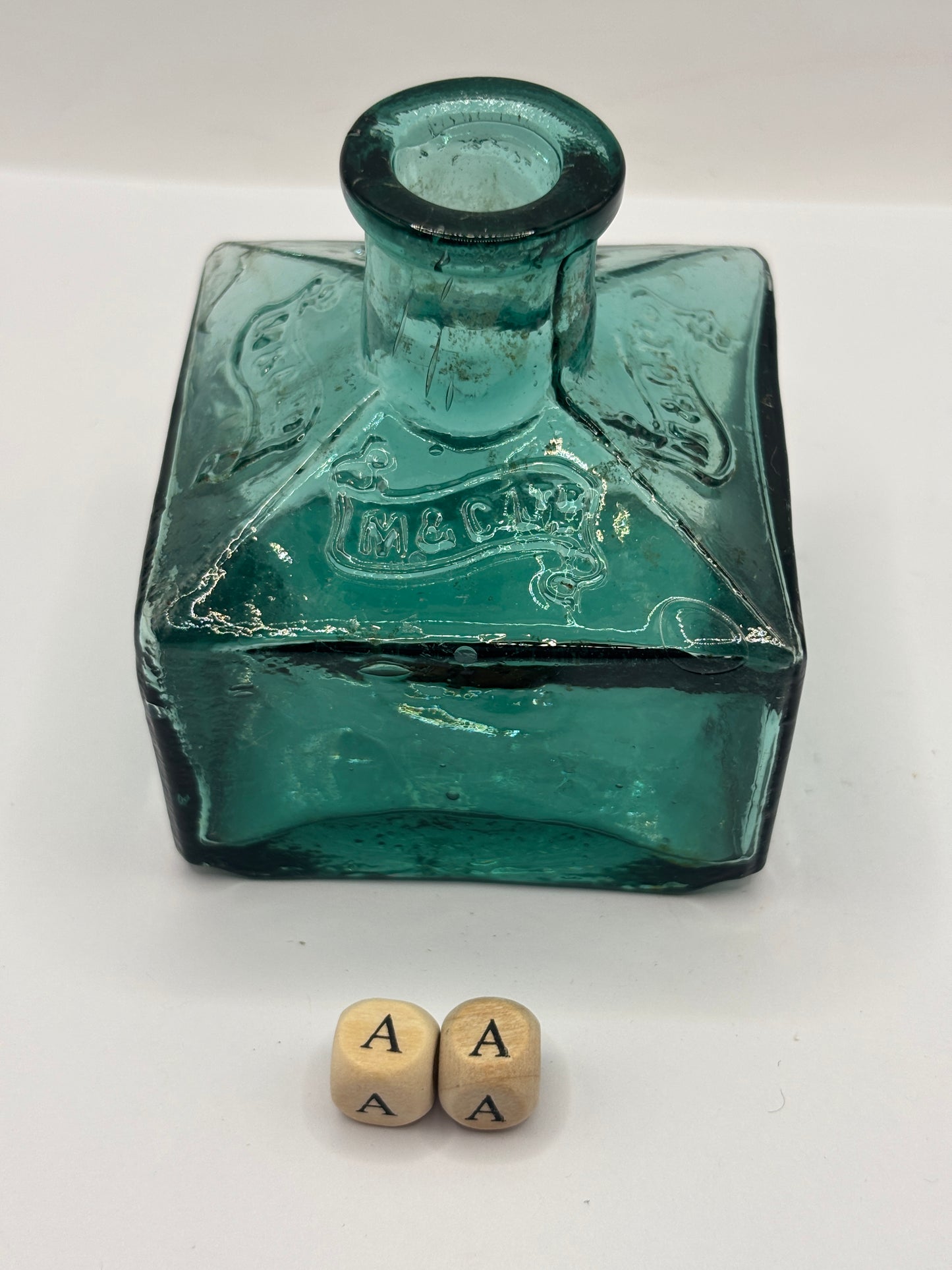 Large green advertising inkwell, ink bottle. M&Co DAMAGED (aa)