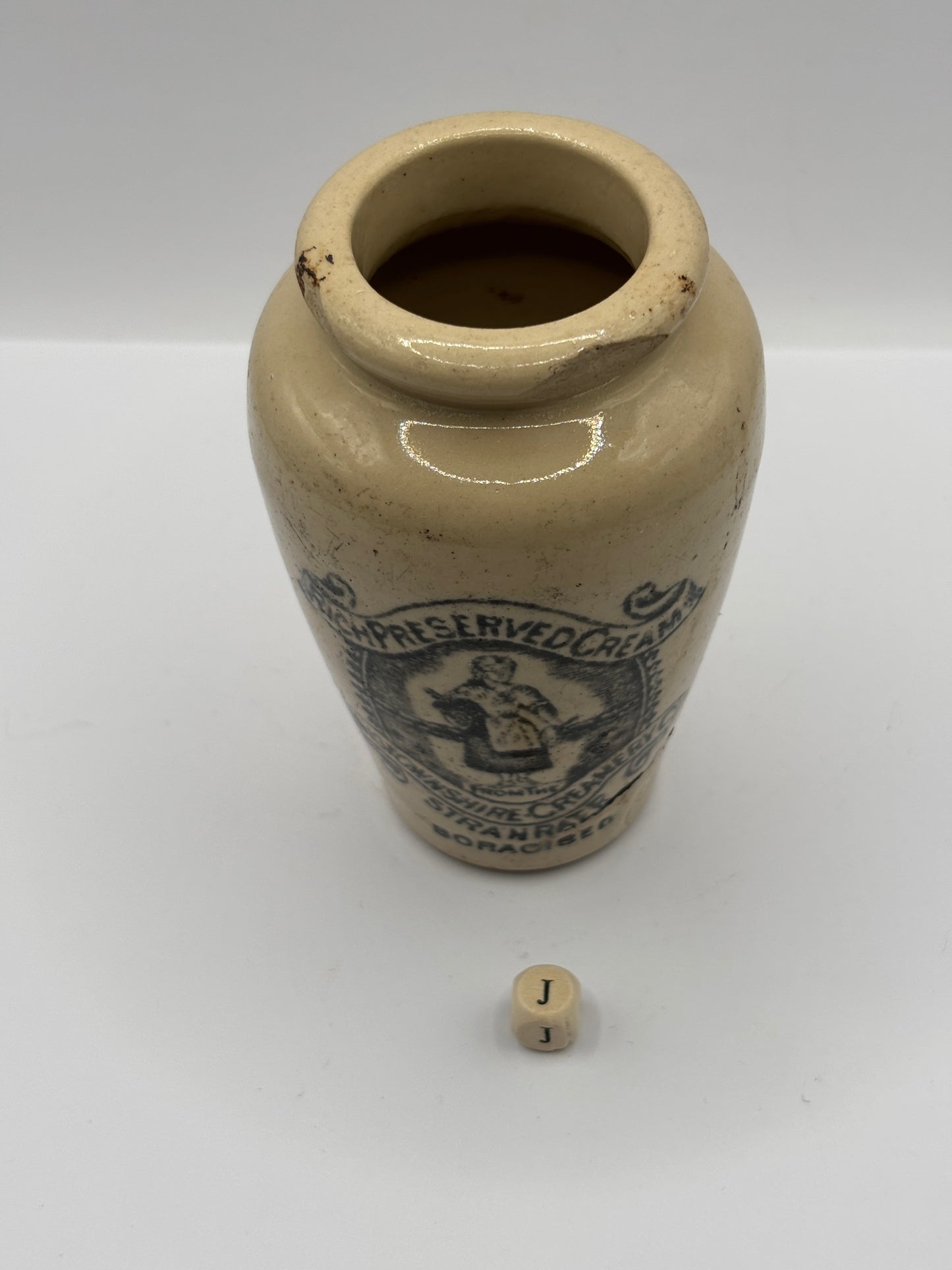 Old advertising cream pot, Rich preserved cream, Stranraer. Milk maid (J) damaged