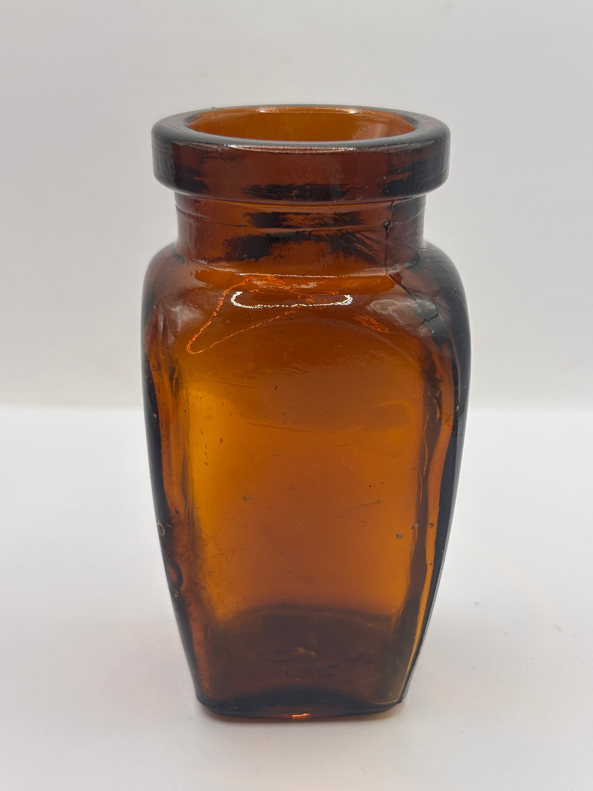 Old amber glass Virolax jar