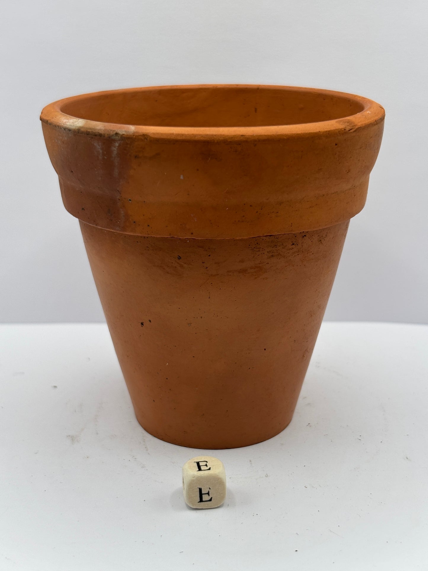 Old terracotta plant pot (e)