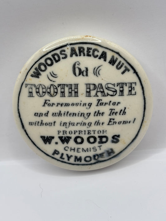 old advertising lid, Woods areca nut toothpaste