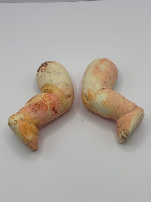 Pair of old dolls legs