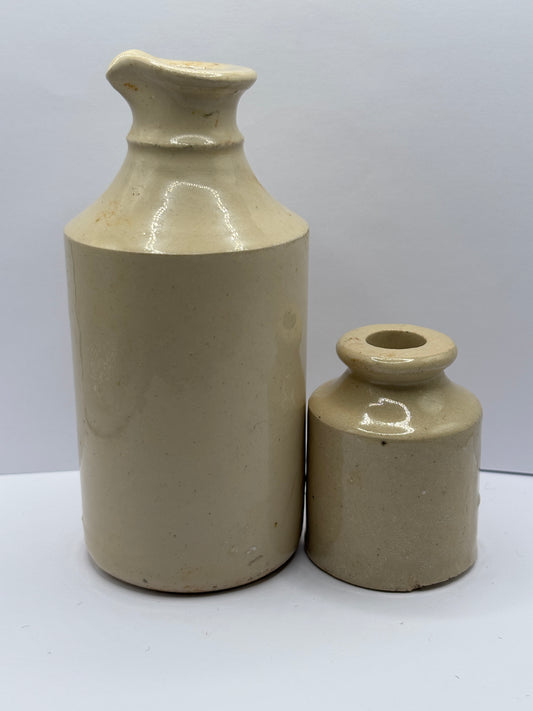 2 old white stoneware bottles