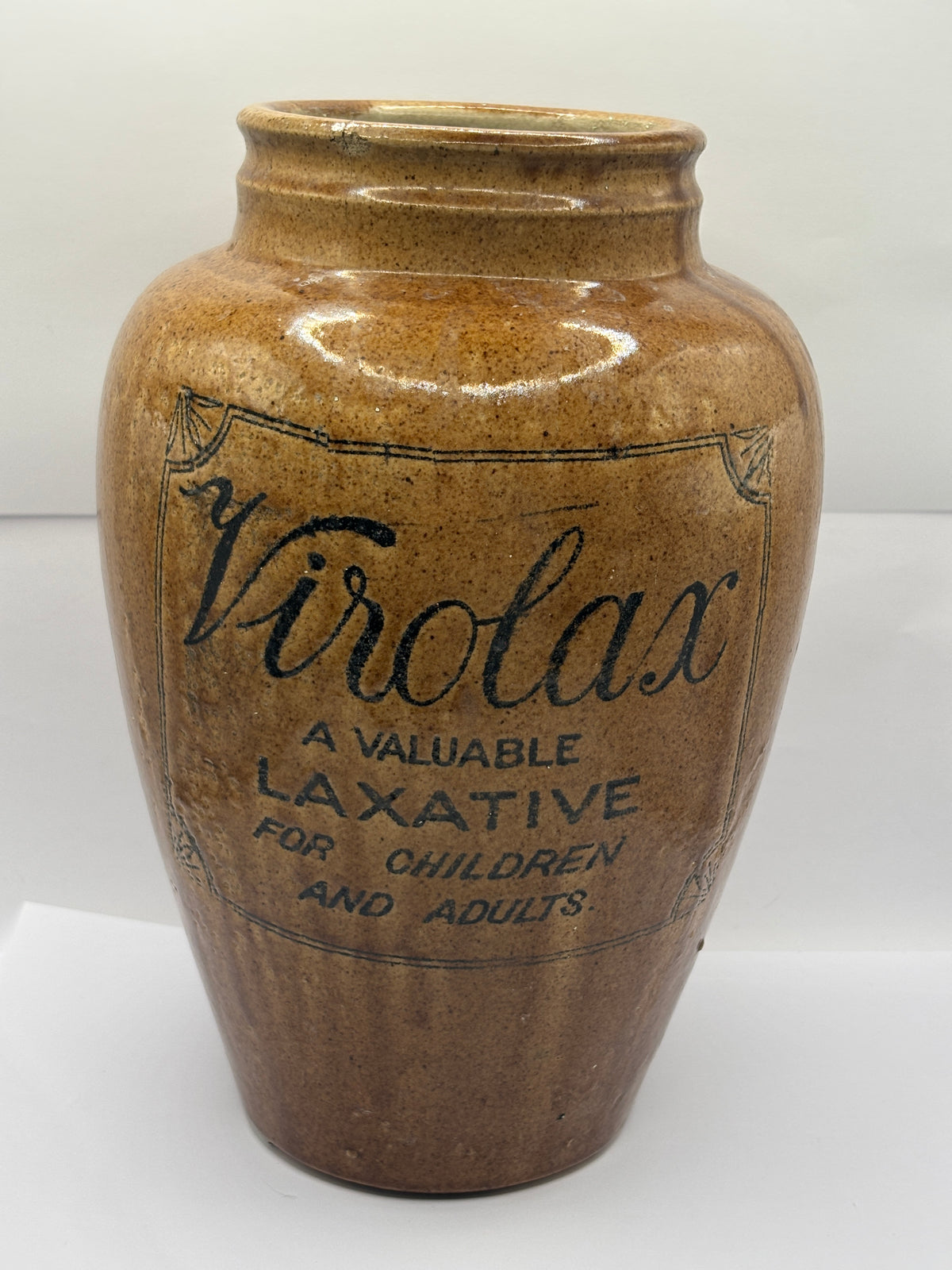 Old rare 9 inch brown stoneware VIROLAX jar