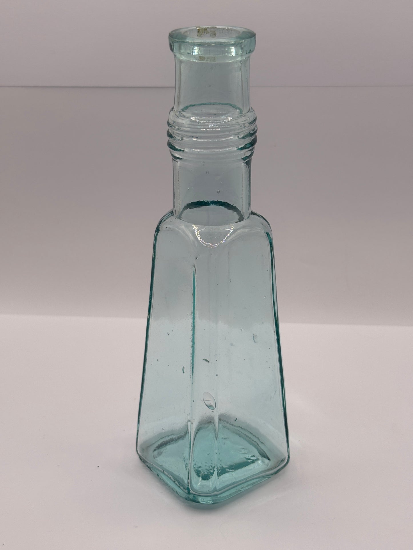 Old aqua glass sauce bottle