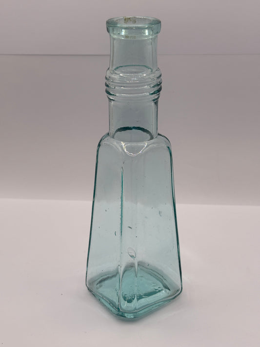 Old aqua glass sauce bottle