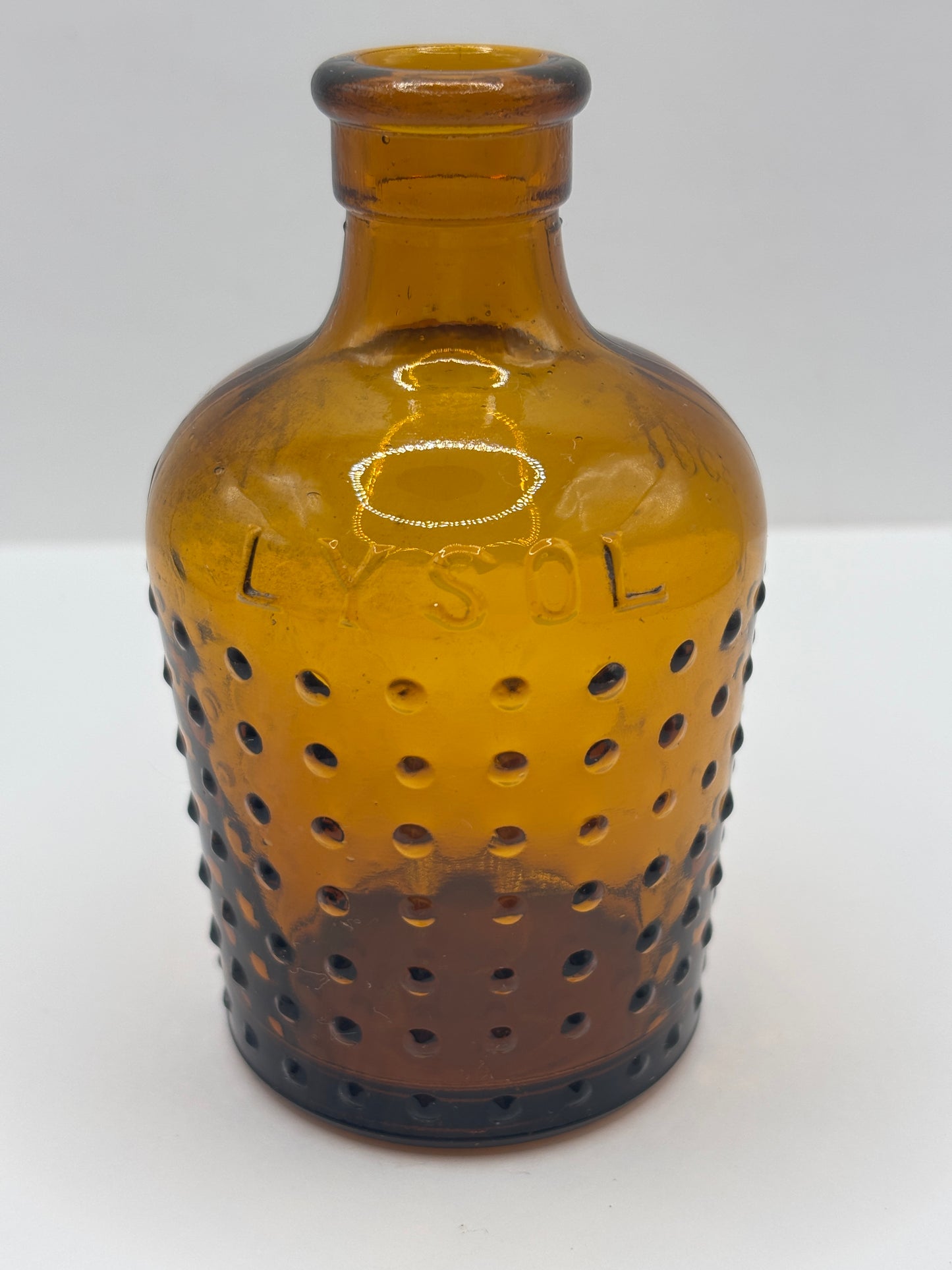 old amber glass Lysol bottle, Boots all british