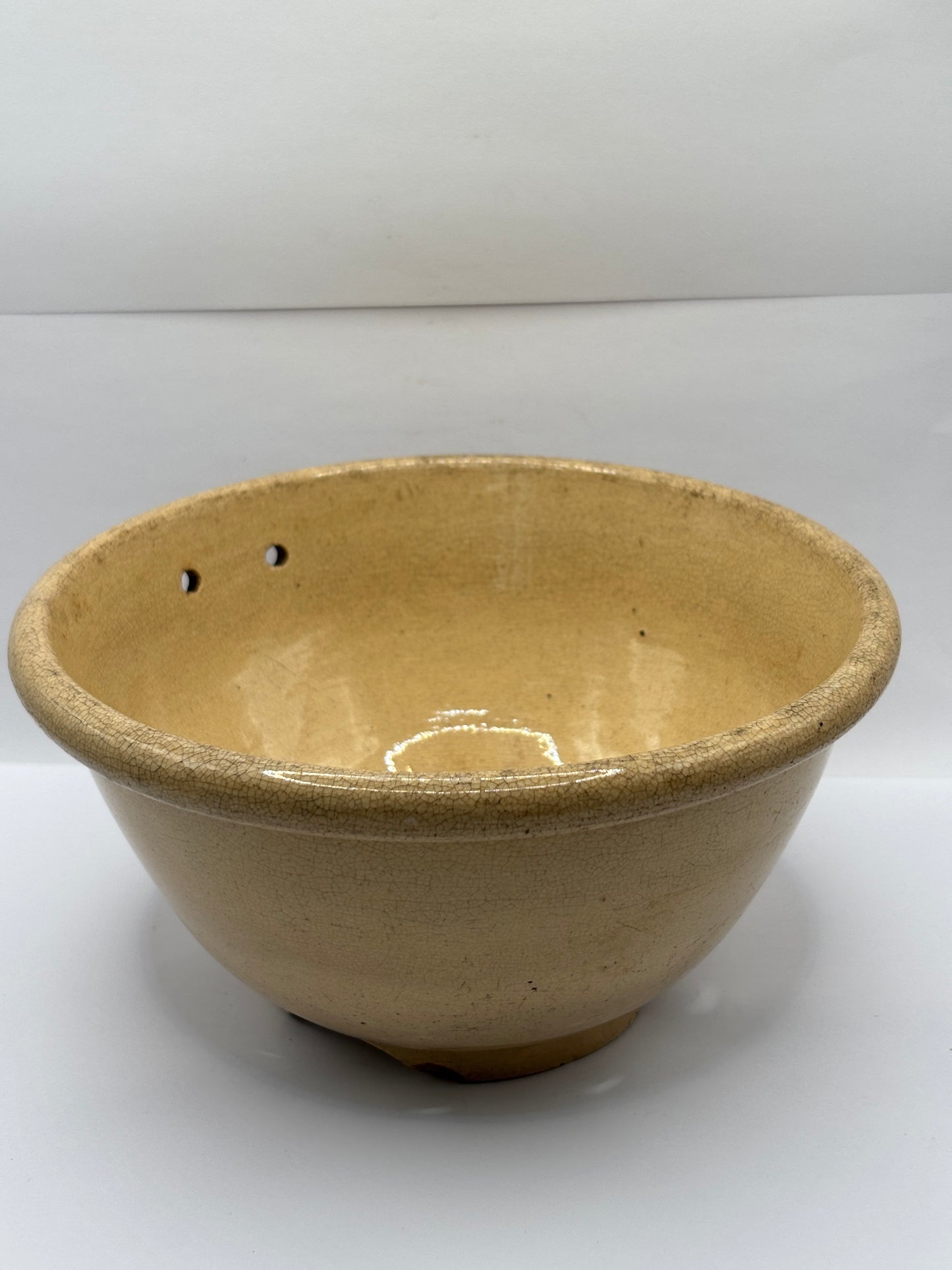 Old English stoneware strainer, crazed