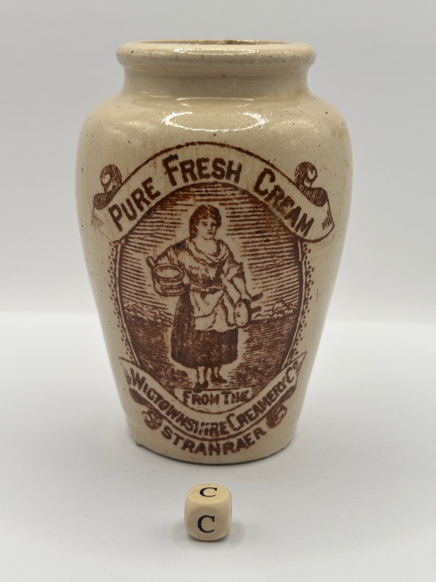 Old stoneware advertising cream pot, pure fresh cream Stranraer. Serpia print (C) milk maid