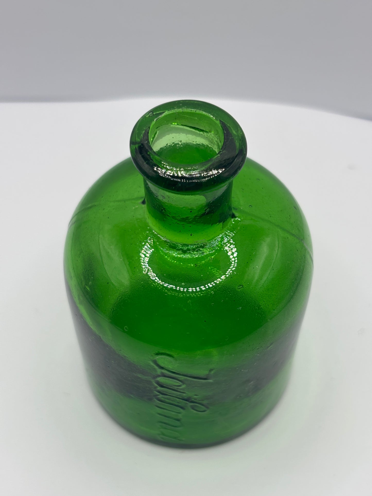Old green glass Icilma bottle