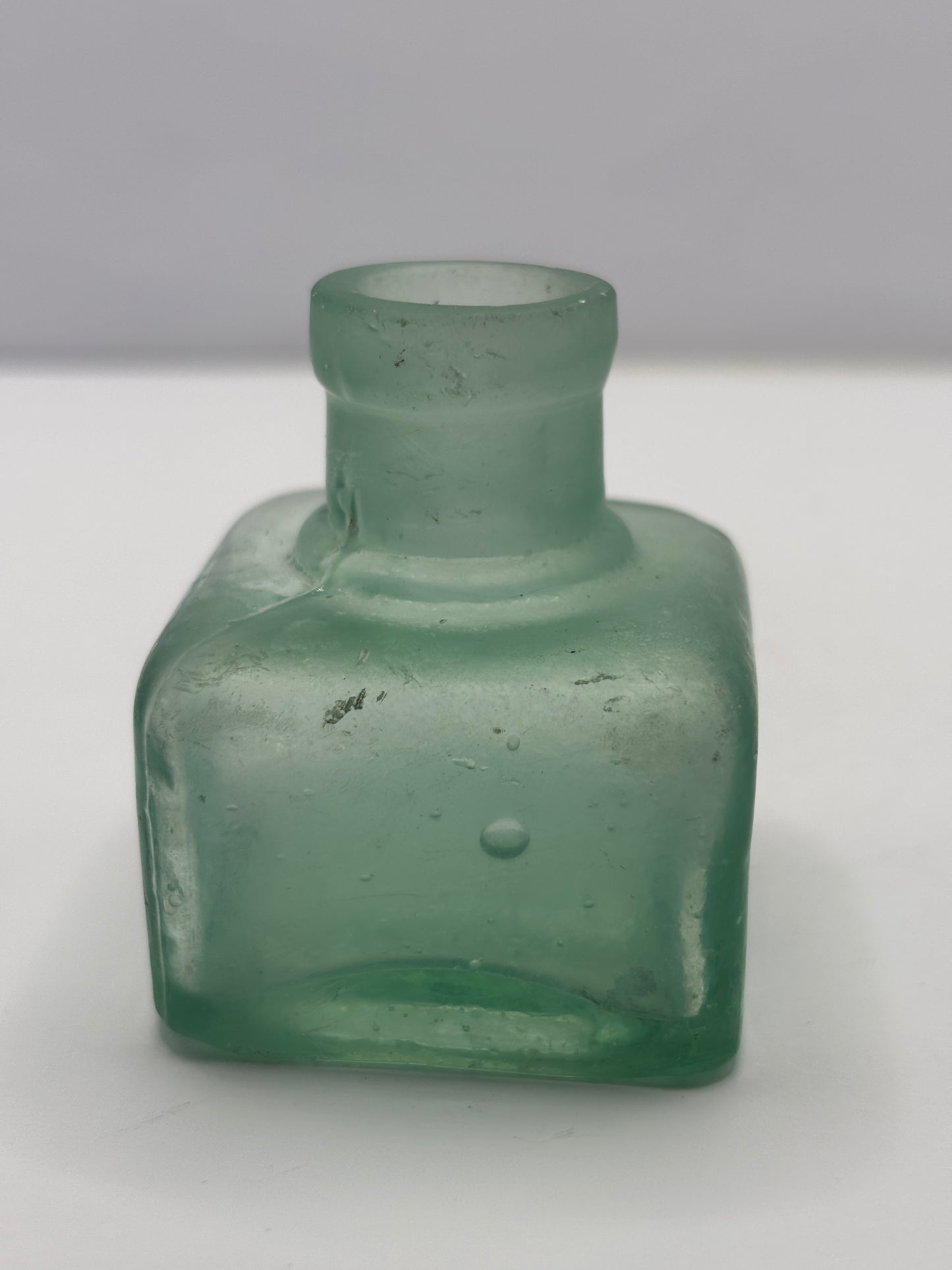 Old free sample inkwell, ink bottle