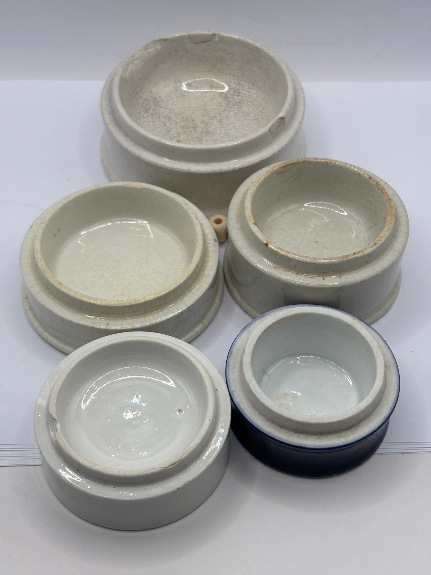 5 old stoneware bases, stackers (L) damages