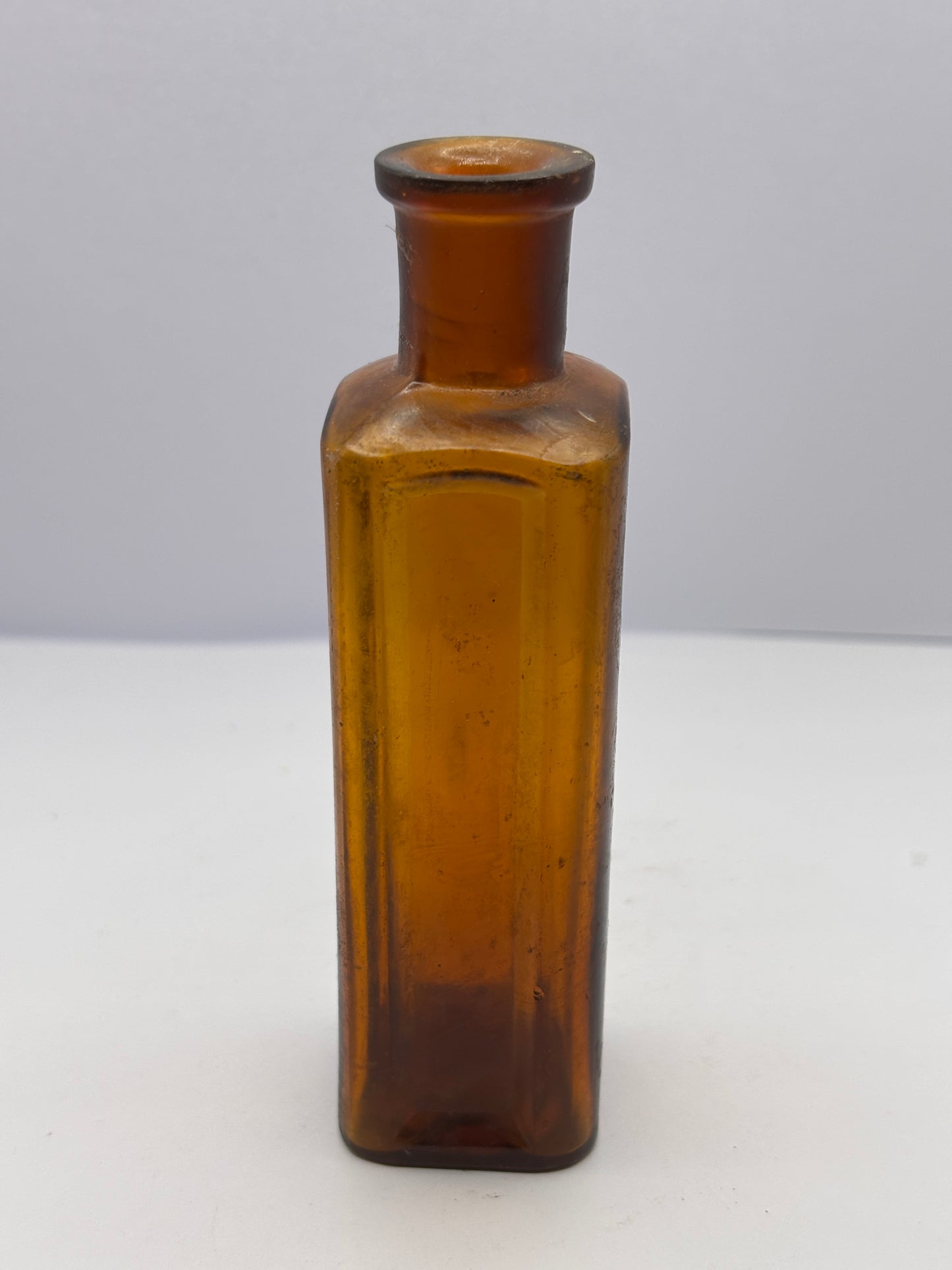 Old amber glass Boots cash chemists bottle
