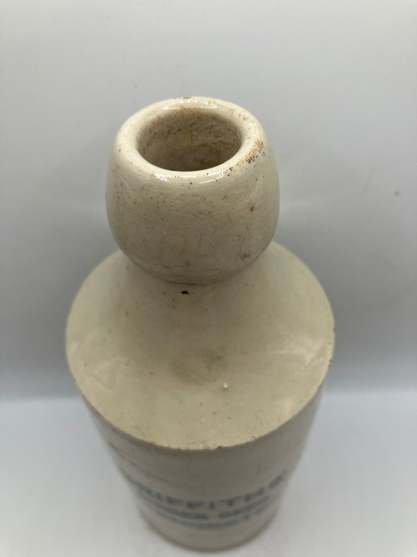 White stoneware ginger beer bottle, Cirencester