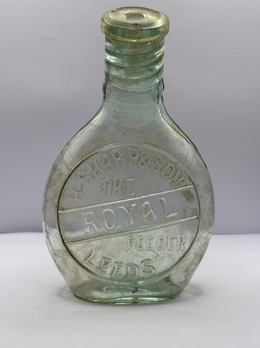 Old clear glass baby feeder. The royal feeder. Leeds