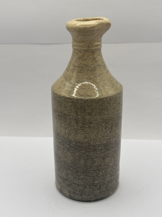Old white stoneware pouring ink