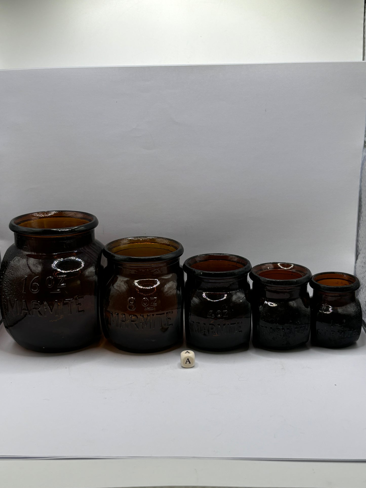 5 old amber glass marmite jars (a)