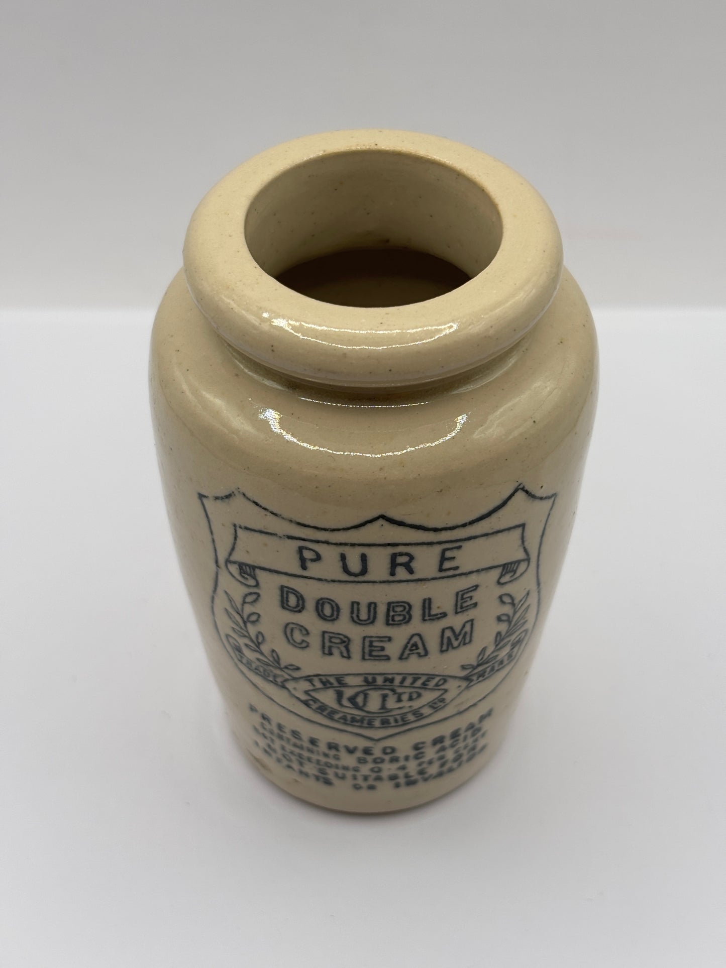 Old advertising stoneware cream pot, Pure double cream. The united creameries