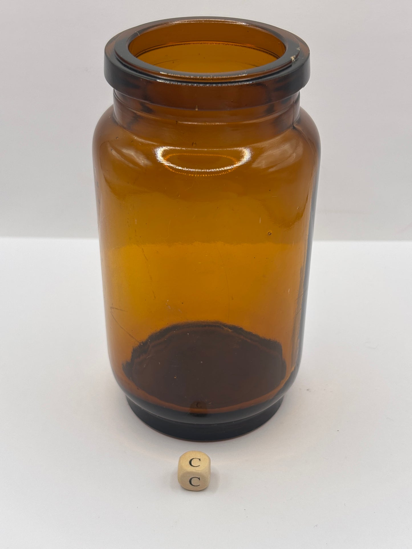 Old amber glass jar (c)