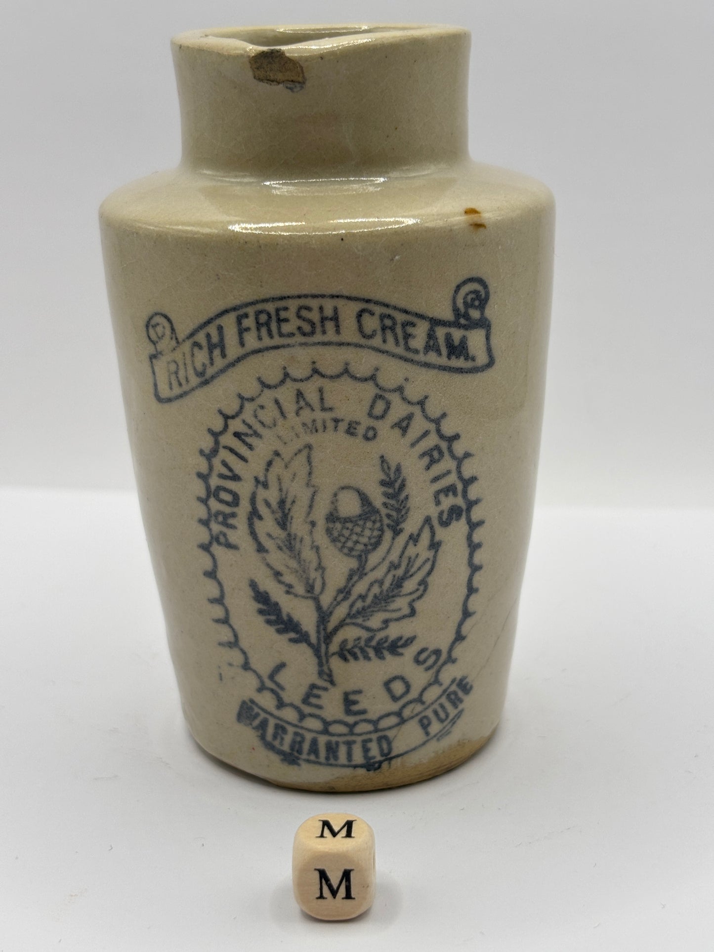 Old stoneware advertising cream pot. Provencial dairies Leeds (M)