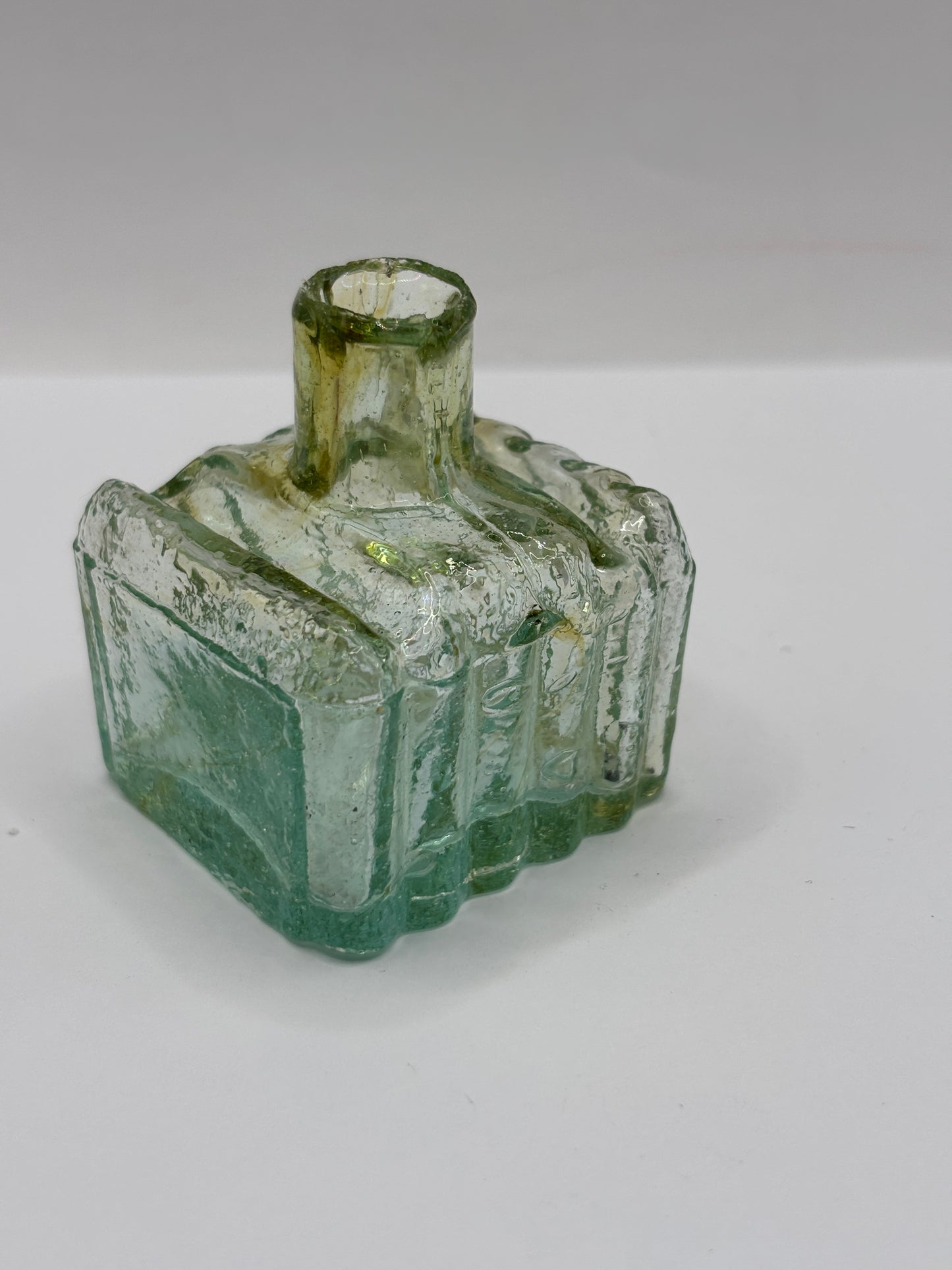 Old aqua glass ribbed ink with swirls