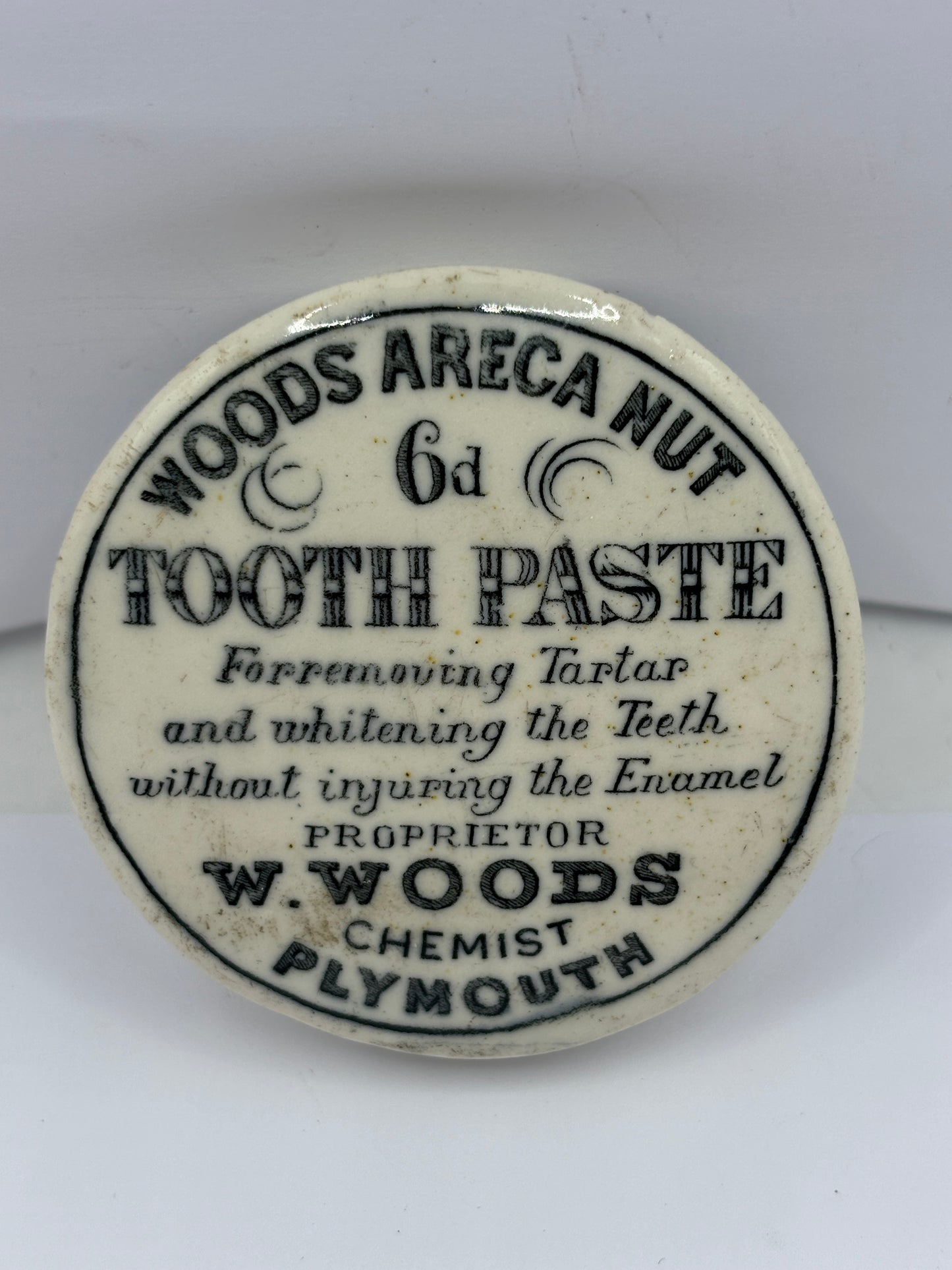 Old Woods advertising pot lid