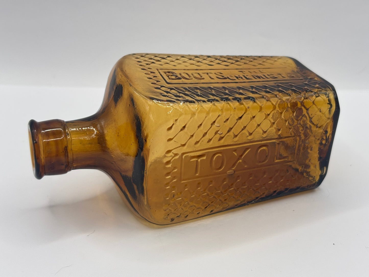 Old amber glass TOXOL bottle, Boots the chemists.