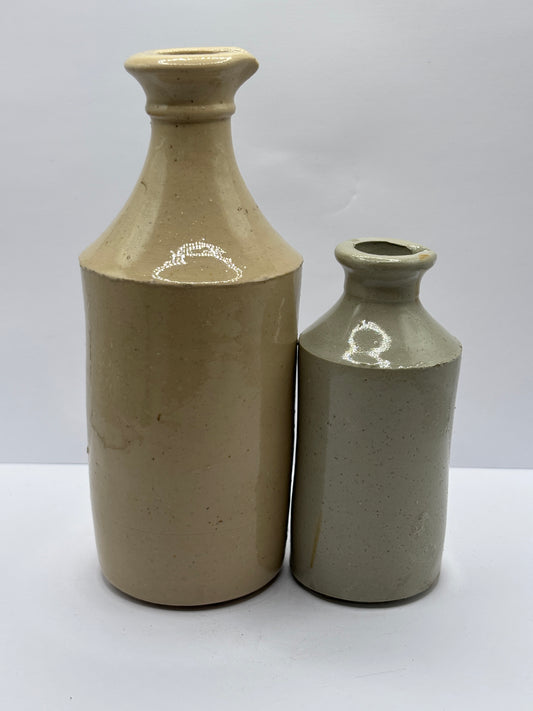 2 old white stoneware pouring ink bottles