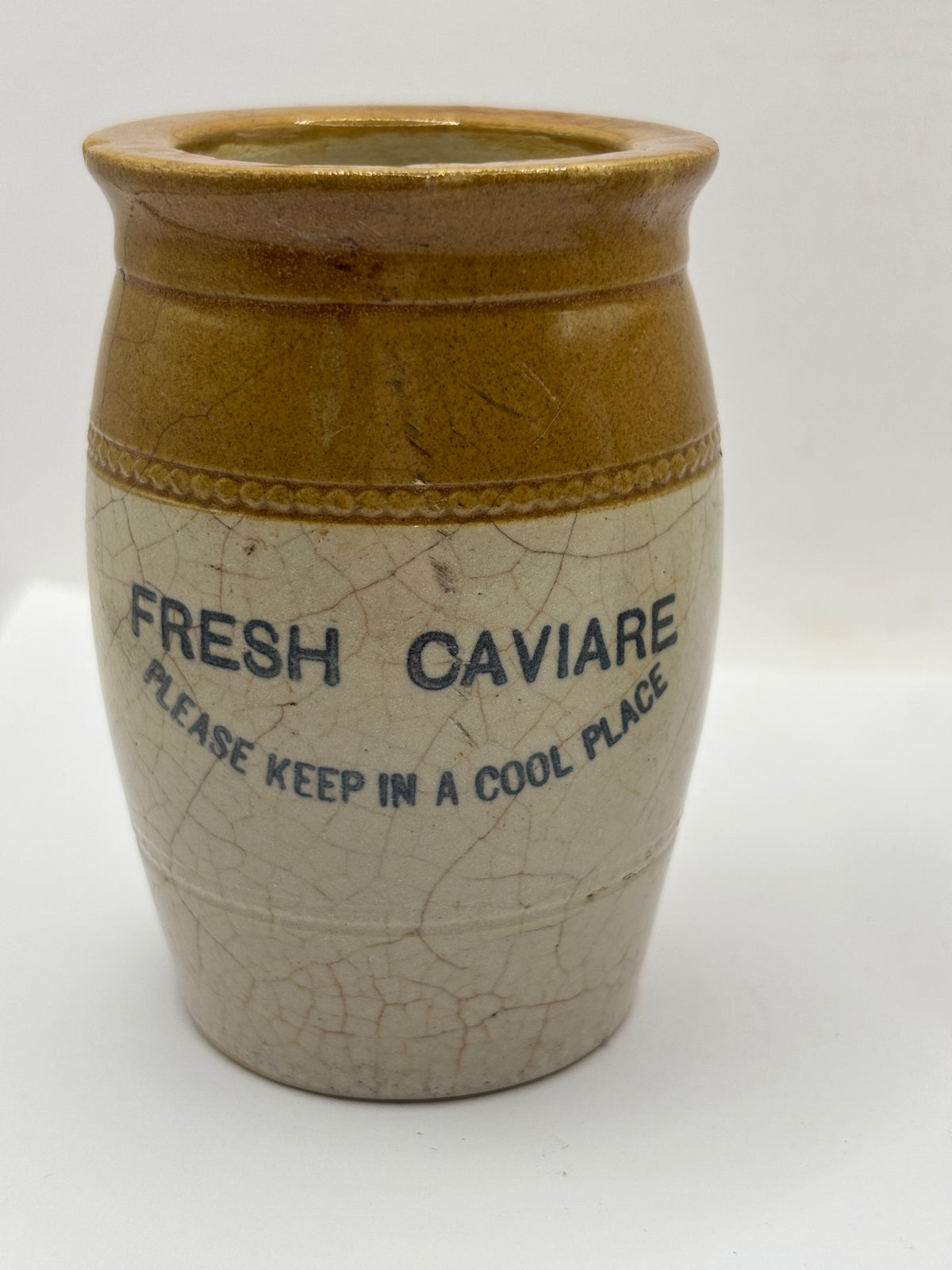 Old stoneware advertising jar, Fresh Caviare