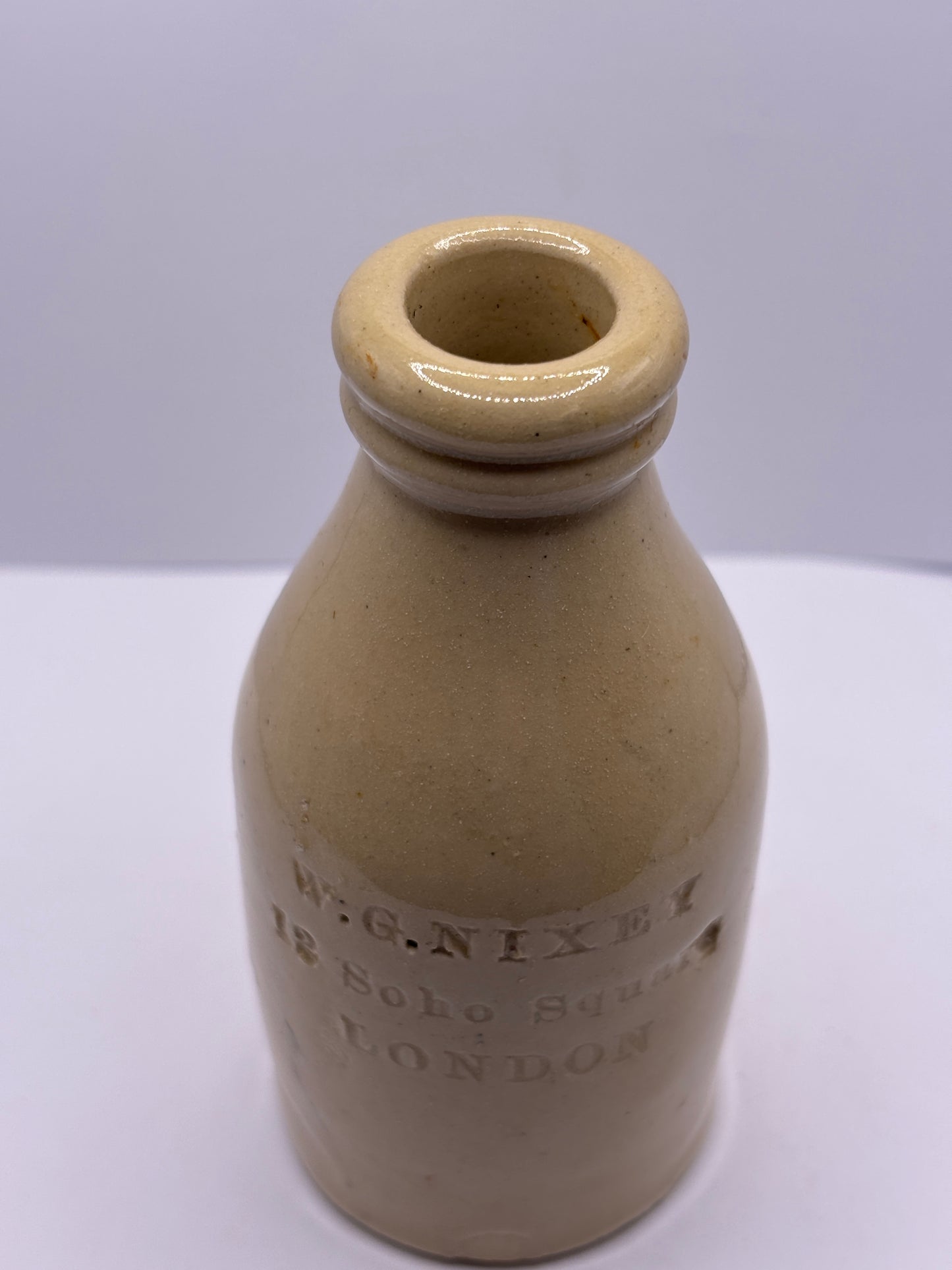 Old stoneware bottle, Nixey London