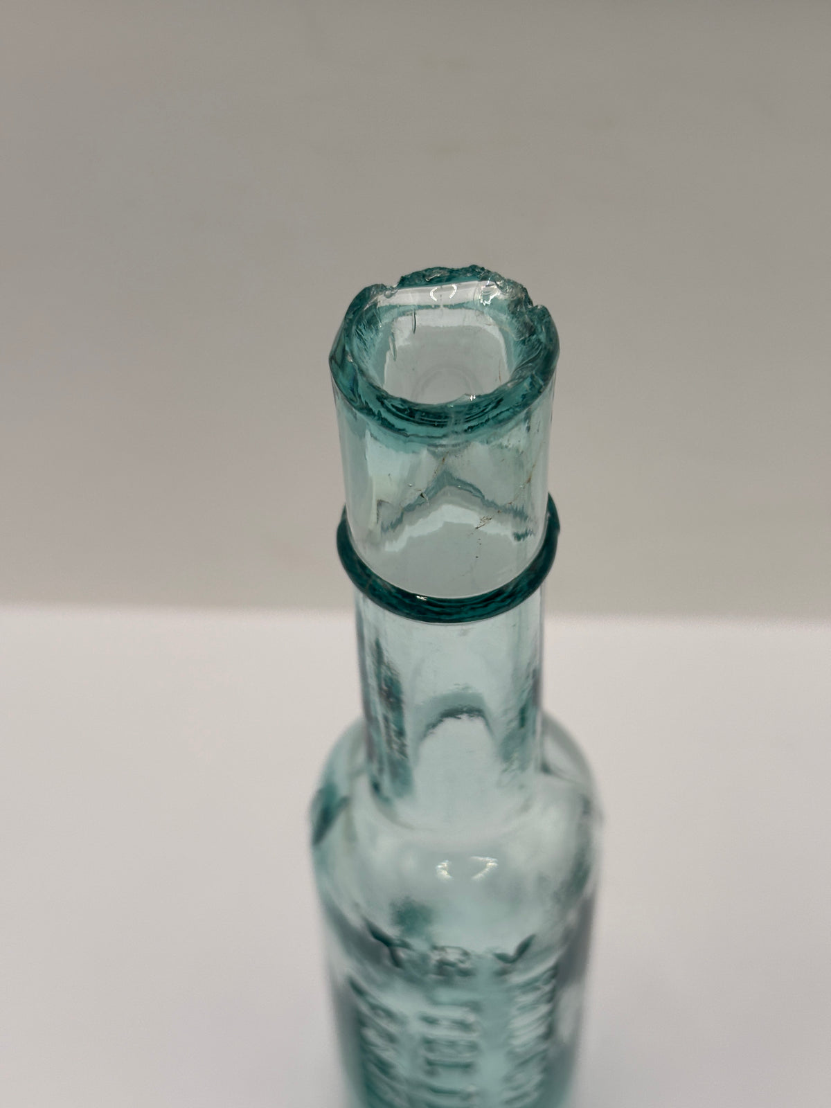 Old aqua glass chemist bottle, Pritchards teething powders