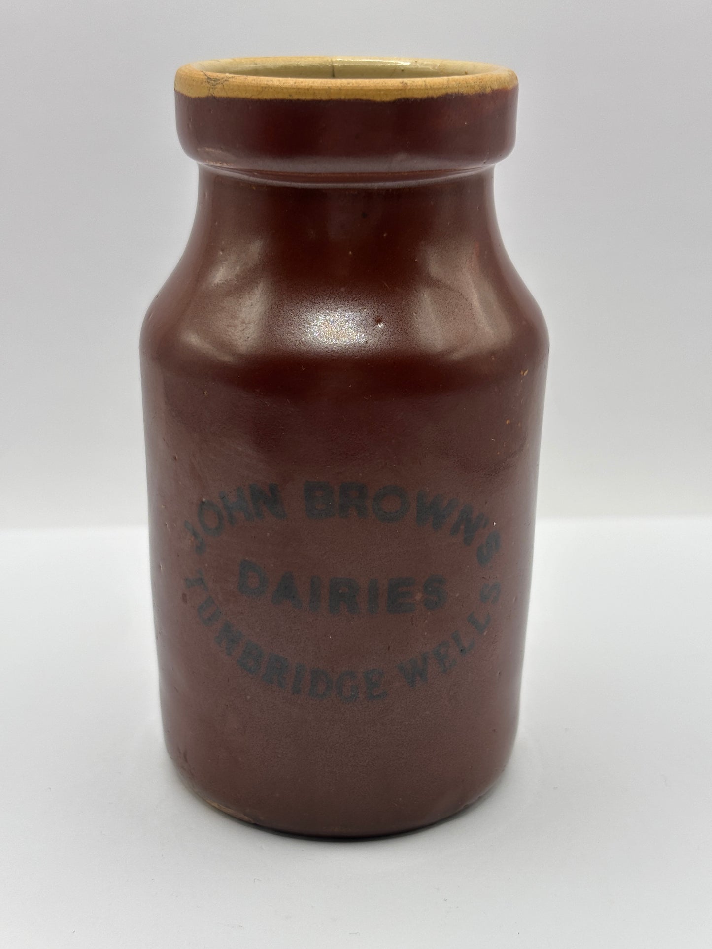 Old advertising cream pot, John Browns dairies Tunbridge wells. Damaged