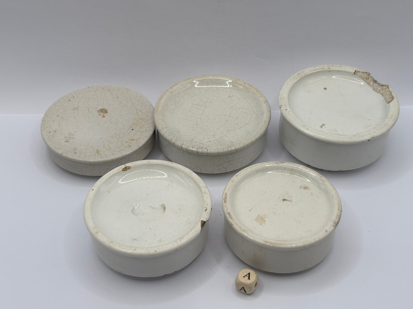 5 pot lid bases/risers/stackers (a)