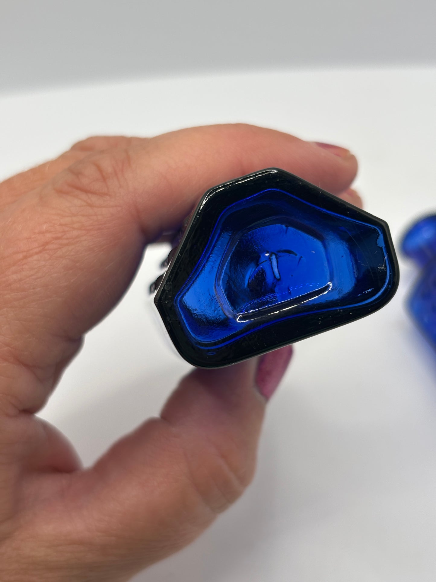 2 old blue flat back poison bottles