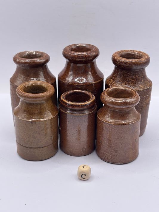 6 small brown stoneware pots (c)