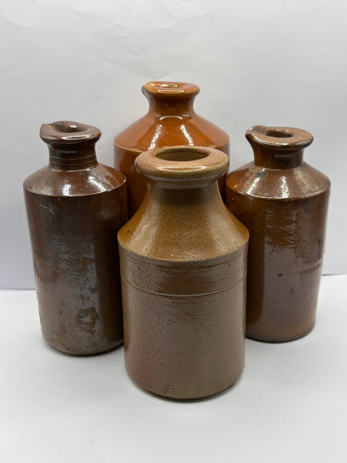 4 old brown stoneware pots