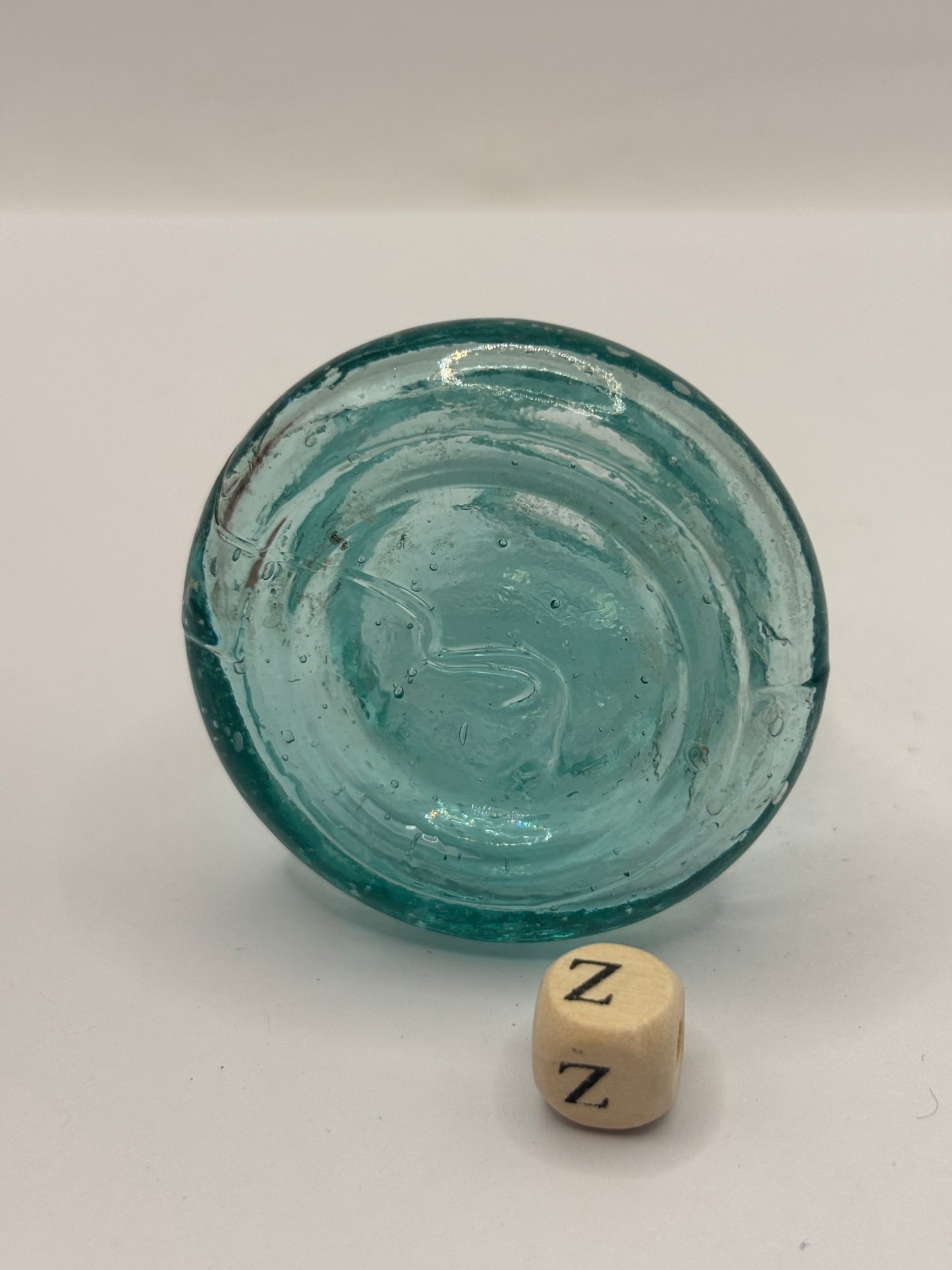 Old aqua glass inkwell, Bell ink (Z)