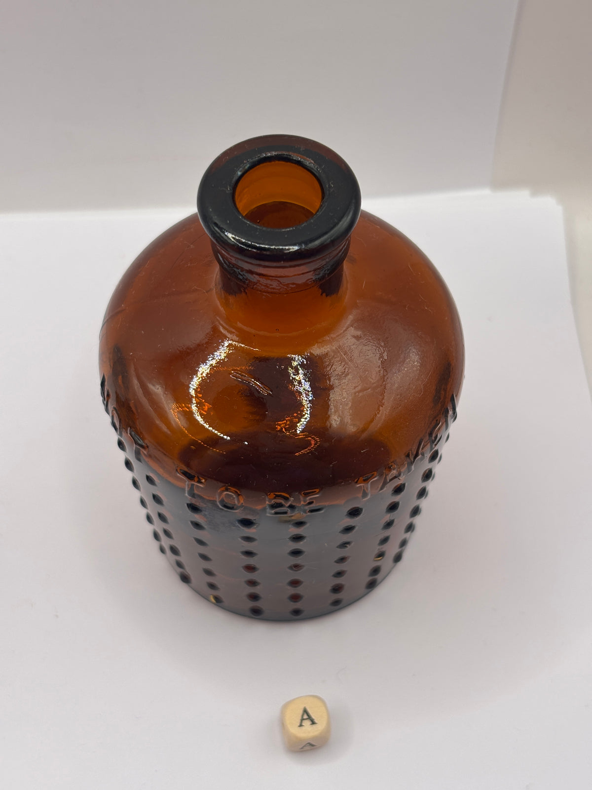 old amber glass Lysol bottle, Not to be taken 11cms (a)