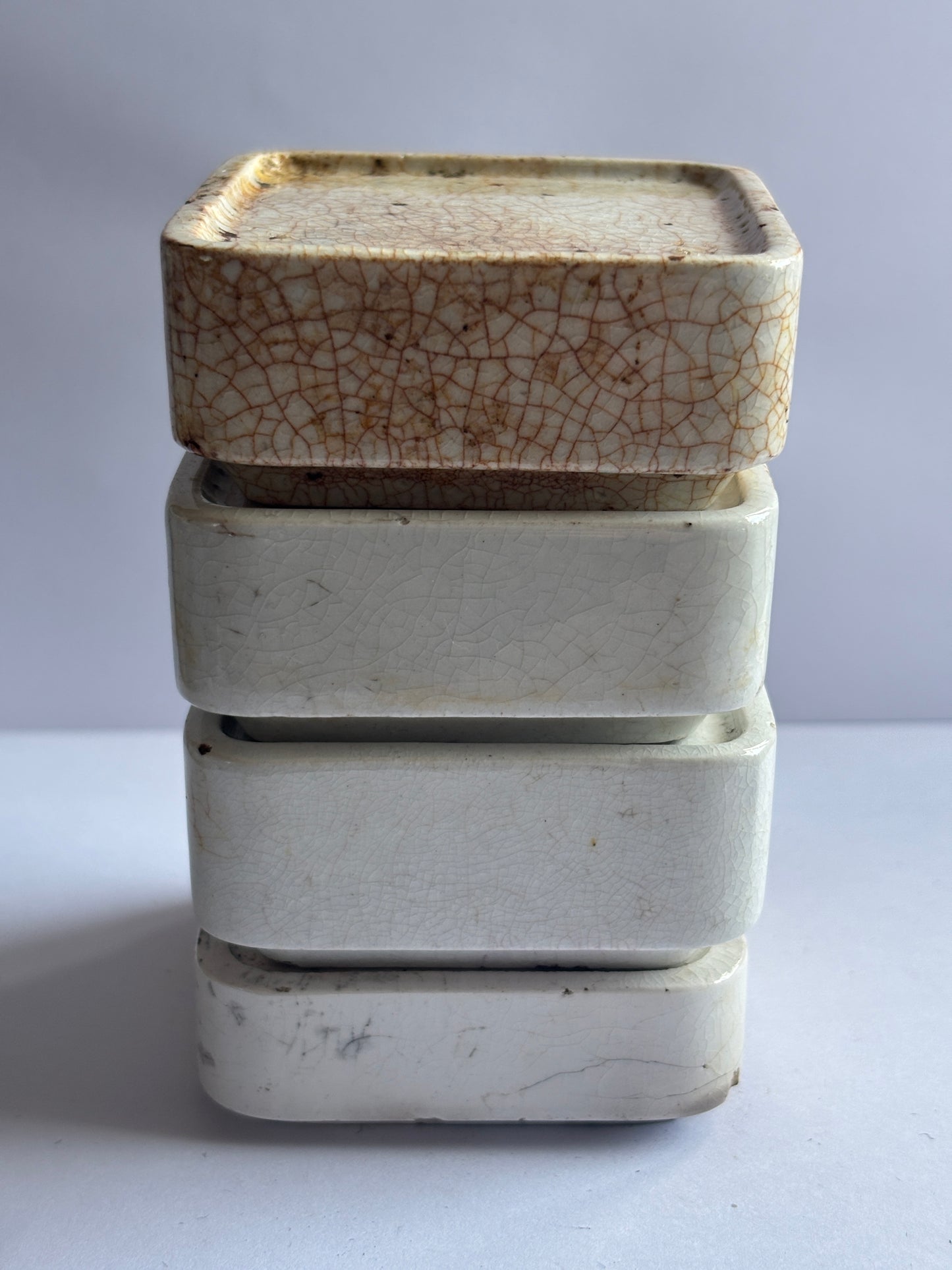 4 old square pot lid bases, stackers, risers