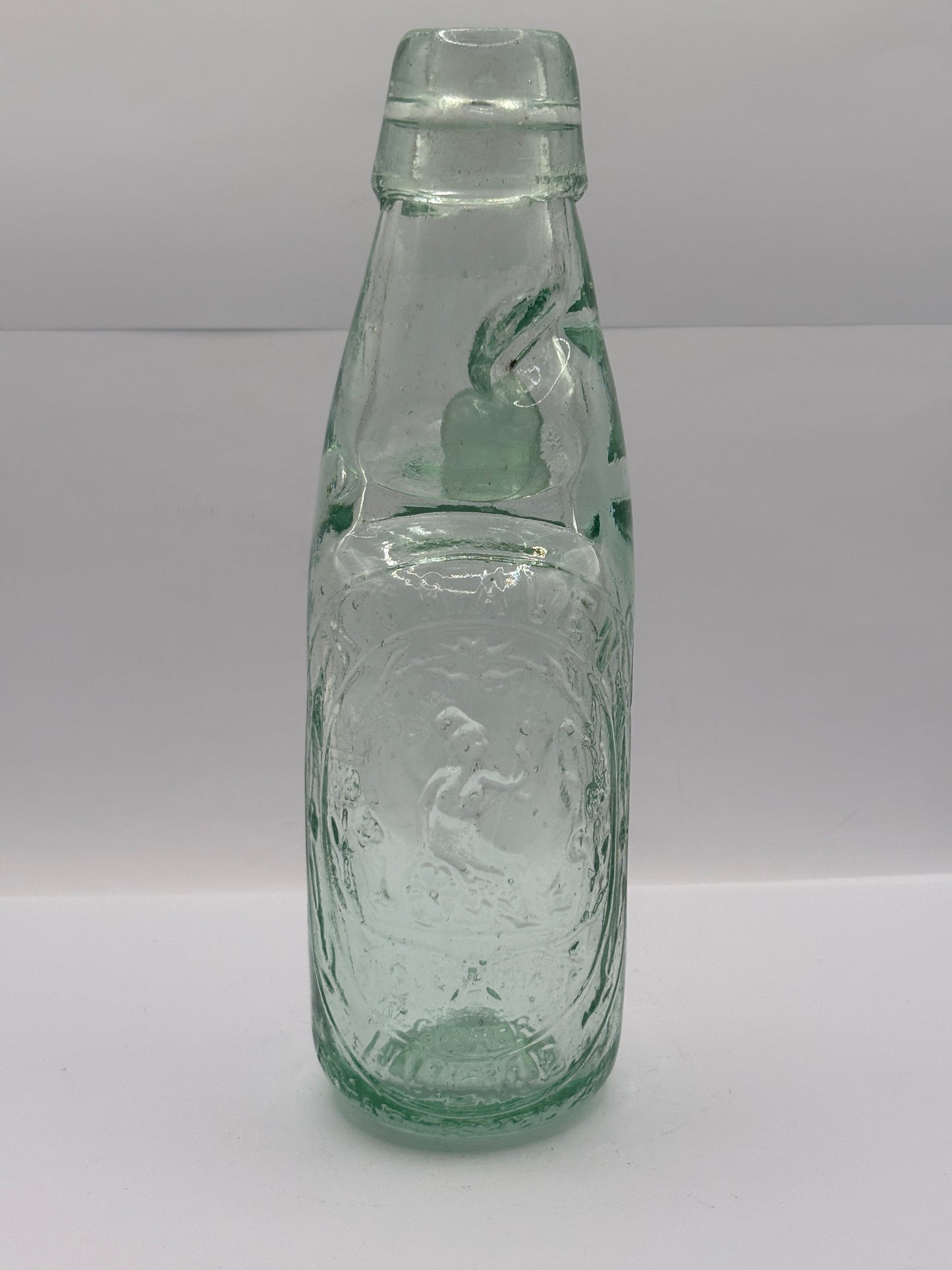 Old Hulme codd bottle, with marble. A.craven Hulme