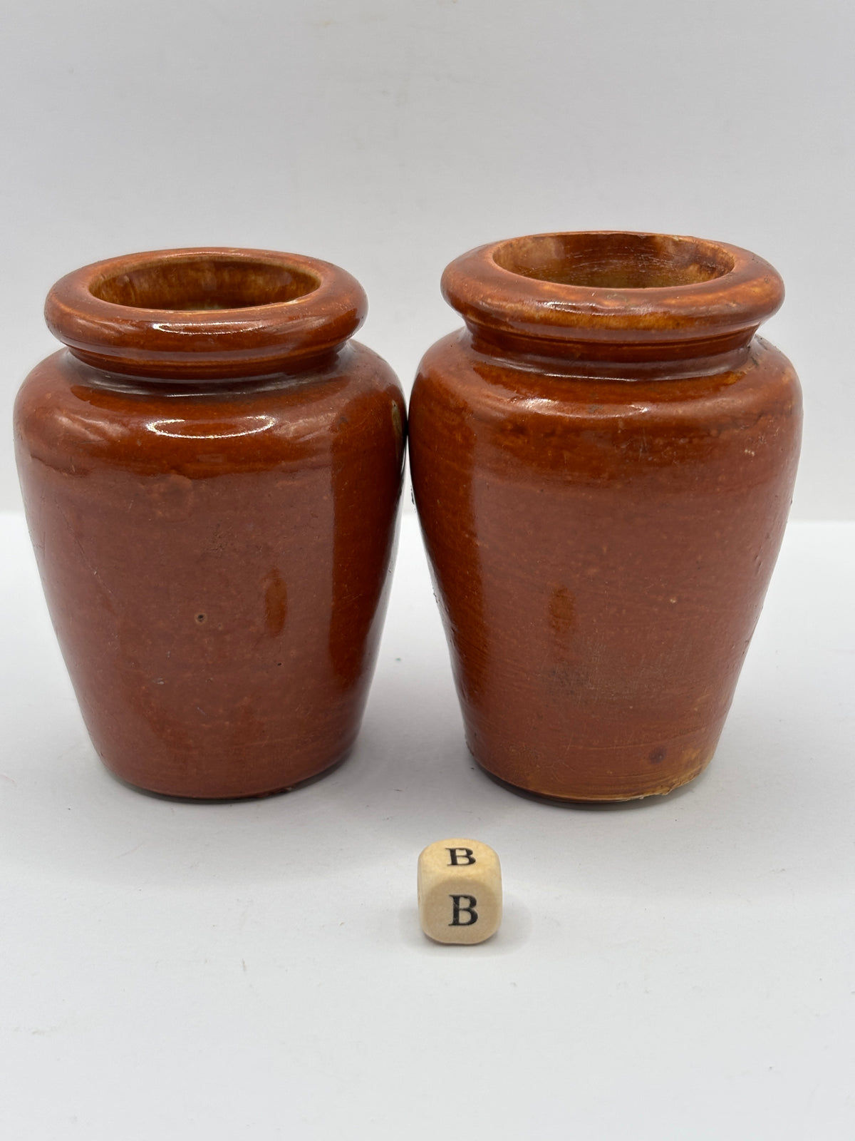 2 Old brown stoneware cream pots (B)